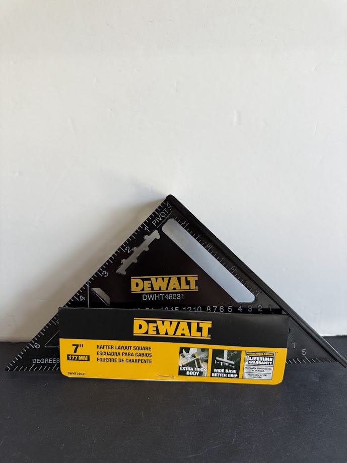 DEWALT 7-inch rafter layout square triangle measuring tool on a dark surface