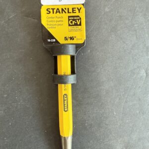 Stanley center punch with yellow handle and metal pointed tip, 5/16 inch (8 mm) size label visible on the yellow body.